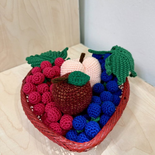Basket with handmade fruit decoration