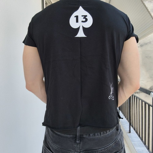 Black t-shirt with safety pins on collar and Bastouni 13 print like new