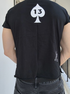 Black t-shirt with safety pins on collar and Bastouni 13 print like new