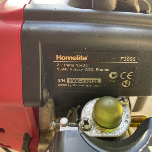 Homelite F3055 Petrol Lawn Mower used with accessories