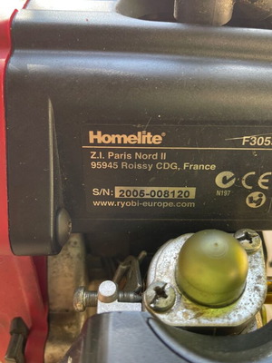 Homelite F3055 Petrol Lawn Mower used with accessories