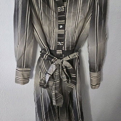 Dress like new black and beige with buttons and belt