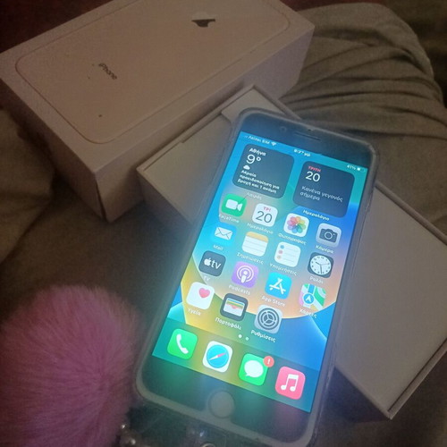 iPhone 8 Plus 64GB used with charger, headphones, 4 cases, 5 screen protectors