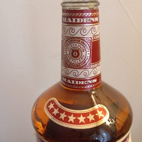 Ouzounis Brandy collectible vintage bottle like new, opened