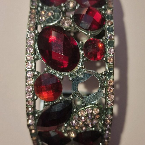 Bracelet used with pink and red stones, some stones missing