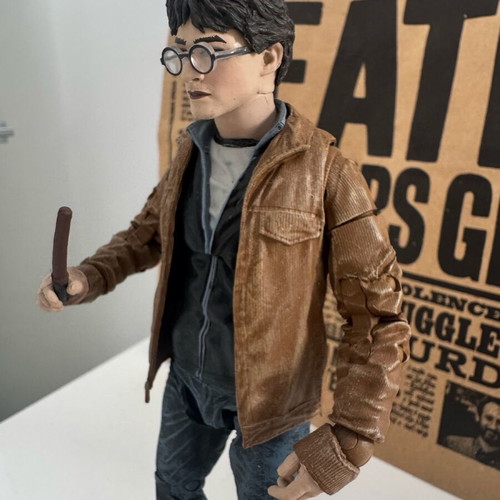 Harry Potter figure like new with base and wand