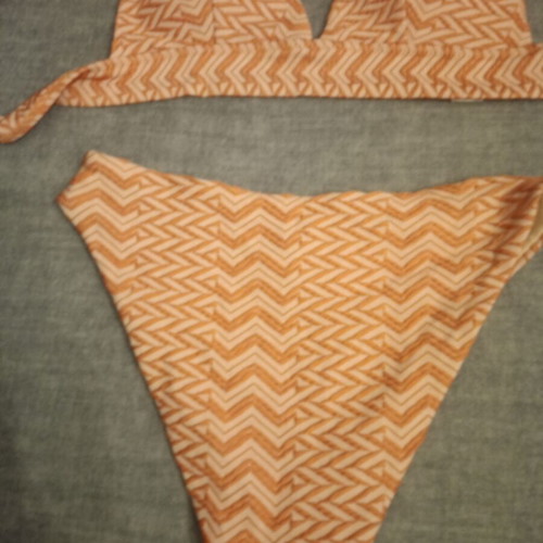Swimsuit with embossed pattern, like new, coral-beige, size S