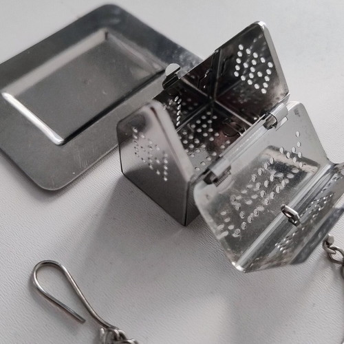 Vintage stainless steel tea infuser house with base and chain like new