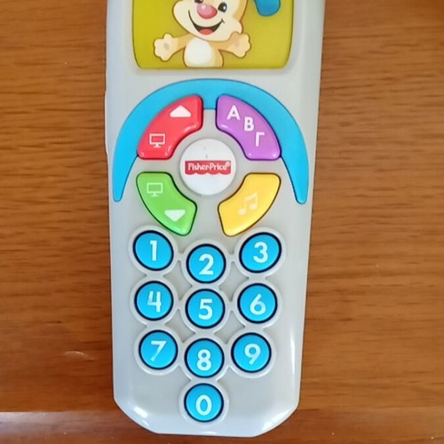 Fisher Price Laugh and Learn remote control used educational toy