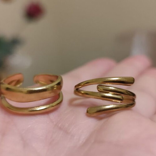 Set of two gold-tone rings size 8, stainless steel, new