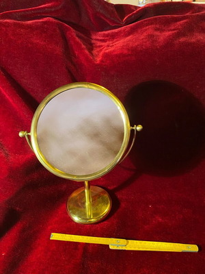 Vintage toilet mirror used with brass frame