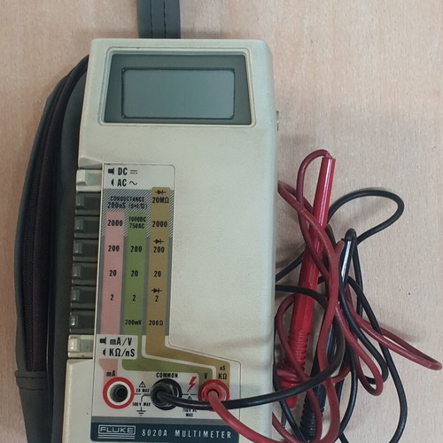 Fluke 8020A digital multimeter used with case
