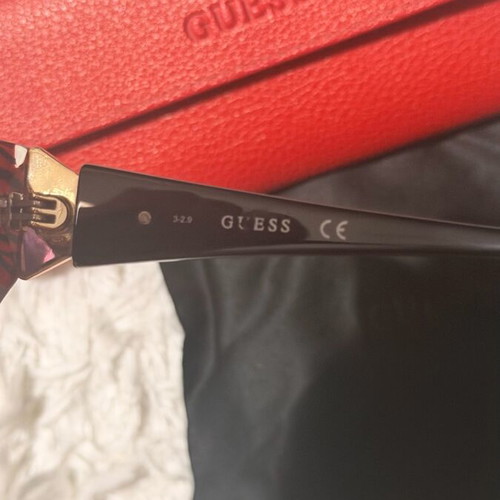 Guess sunglasses used, black and white, with case and cloth