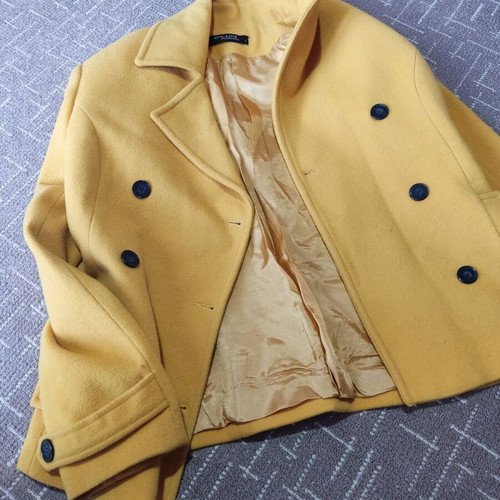 On Line half-length coat like new, yellow size M