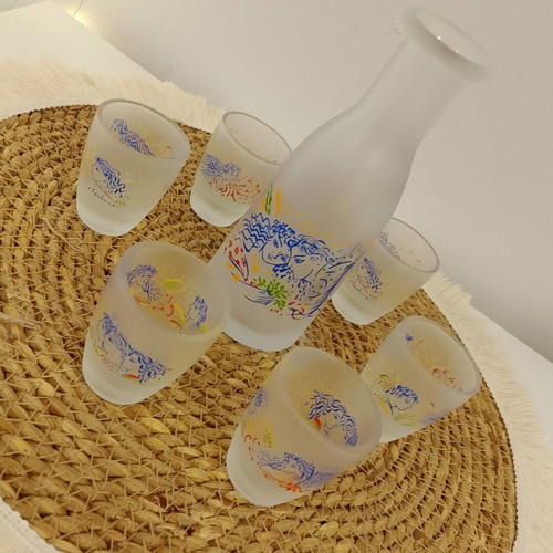 Serving set with carafe and six shot glasses decorated by Giorgos Stathopoulos, like new