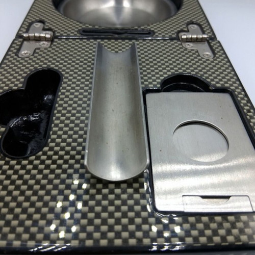 Cigar accessory set box like new with carbon fiber finish