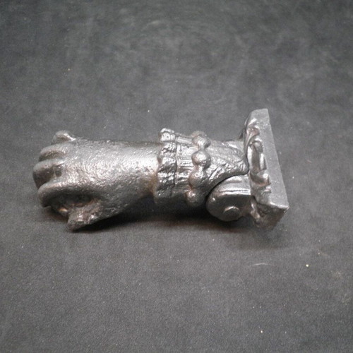 Antique iron door knocker used, made of cast iron