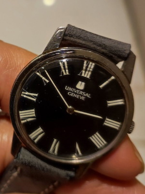 Universal Geneve 1-42 manual winding watch used, 31mm case, leather strap