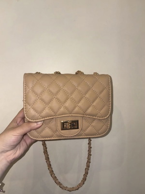 Quilted beige and baby pink nude crossbody bag with gold chain