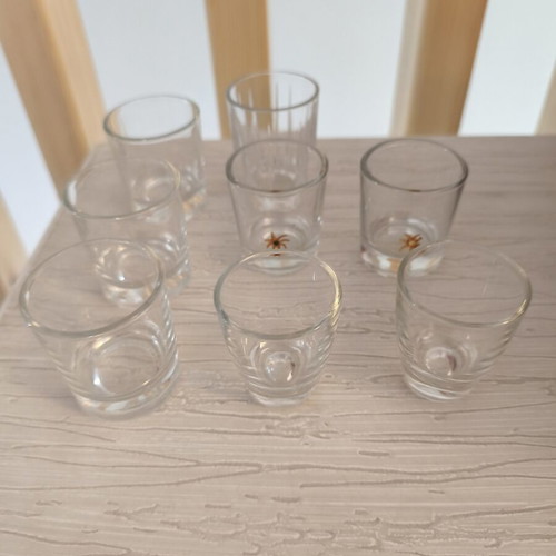 Shot glasses set of 8 with different designs like new