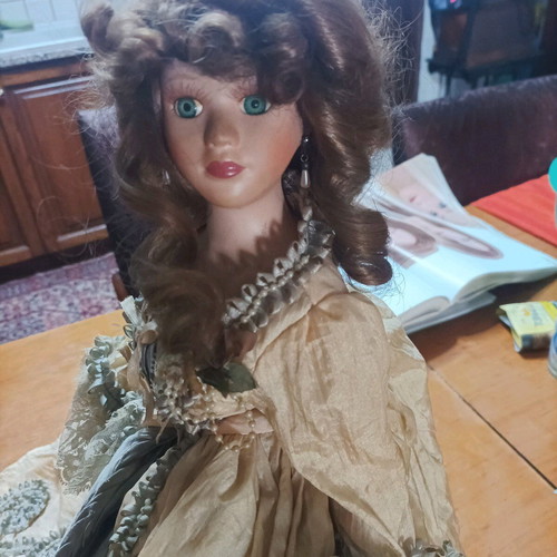 Vintage porcelain doll used