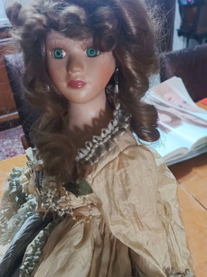Vintage porcelain doll used