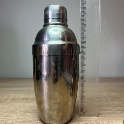 Cocktail shaker and jigger used, stainless steel