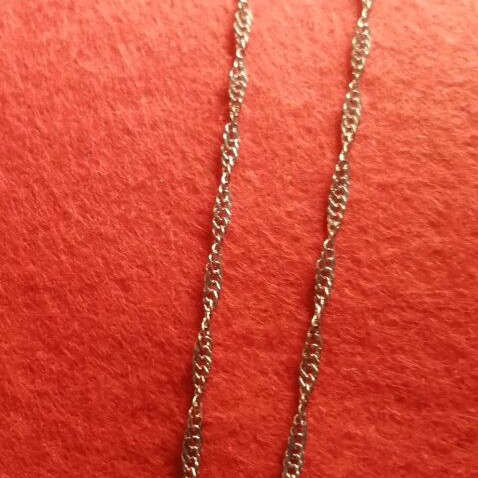 Necklace and matching earrings like new with stone, silver color
