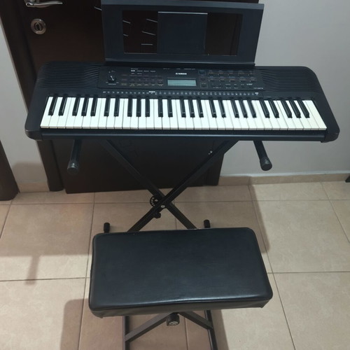 Yamaha PSR E273 keyboard like new with stand and seat