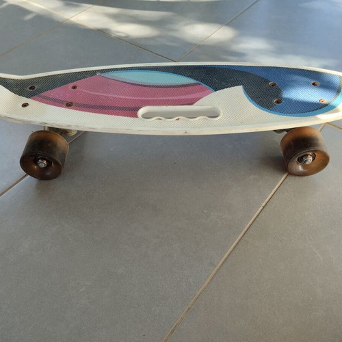 Skateboard used with light-up wheels and protective gear