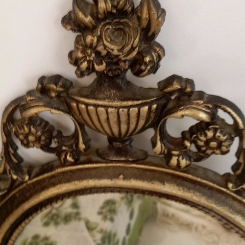 Oval bronze mirror used, antique style with gold paint