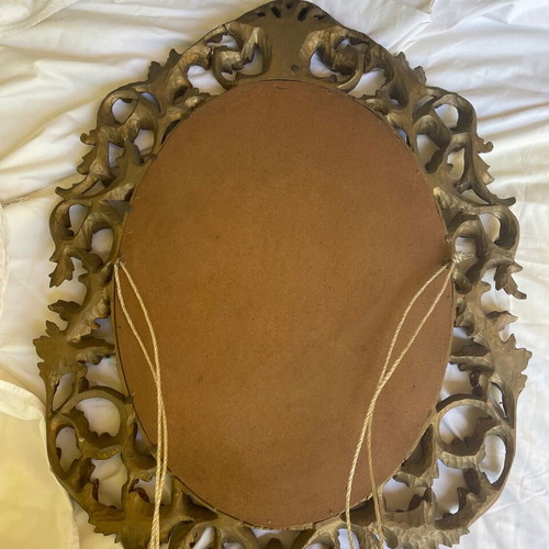 Antique mirror used with hand-carved frame over 100 years old
