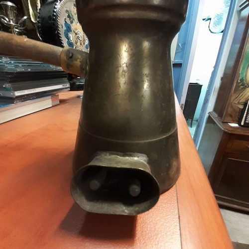 Electric brass briki used with wooden handle