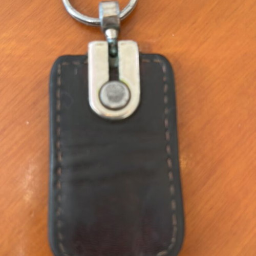 Guy Laroche leather keychain used, brown
