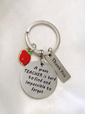 Steel keychain "The Best Teacher" new, black and silver
