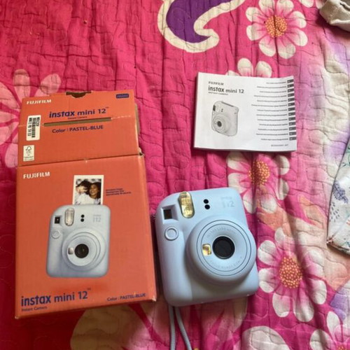 Instax Mini 12 brand new instant camera with film