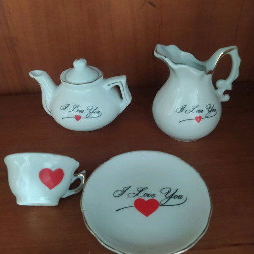 Miniature tea set used with gold line wear
