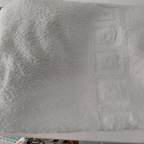 Beach and bath towels like new, 2 large, white and printed