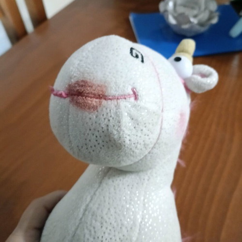 Stuffed unicorn used with marks