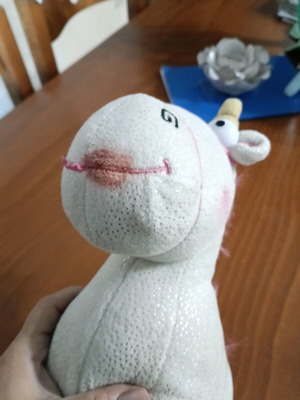 Stuffed unicorn used with marks