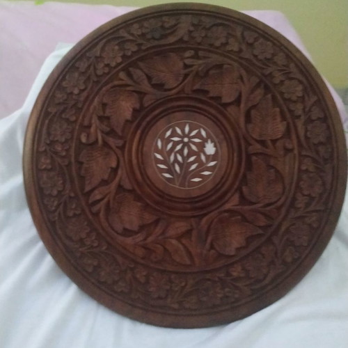 Wooden carved wall decor used, also fits on a stand
