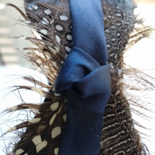 Blue women's headband with feathers used