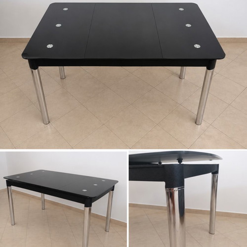 Extendable kitchen dining table with black glass top and metal legs