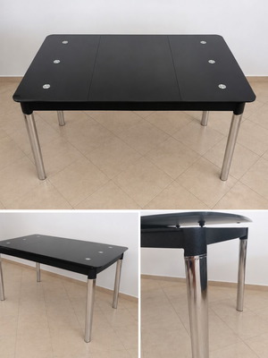 Extendable kitchen dining table with black glass top and metal legs