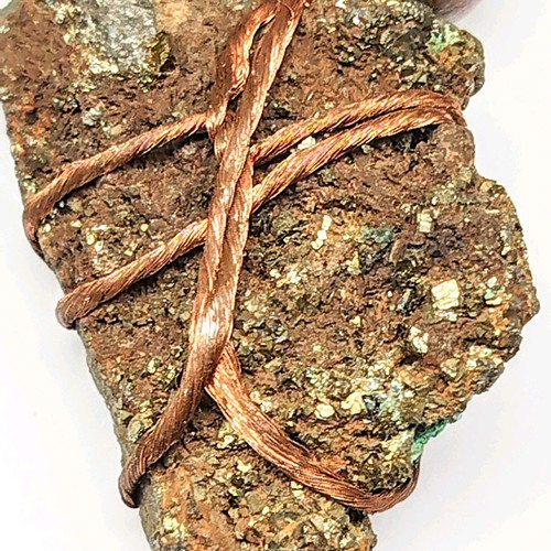 Pendant with pyrite new, gold copper wire and leather
