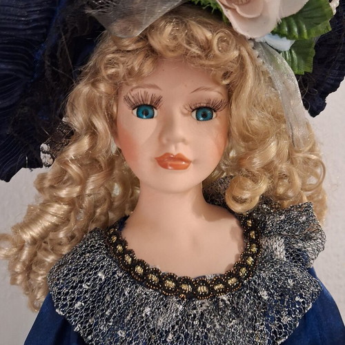Porcelain doll 60 cm used