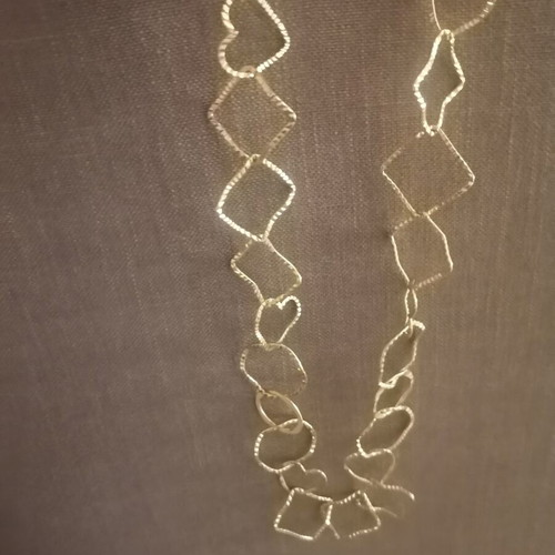 Necklace with circles, squares and hearts, like new