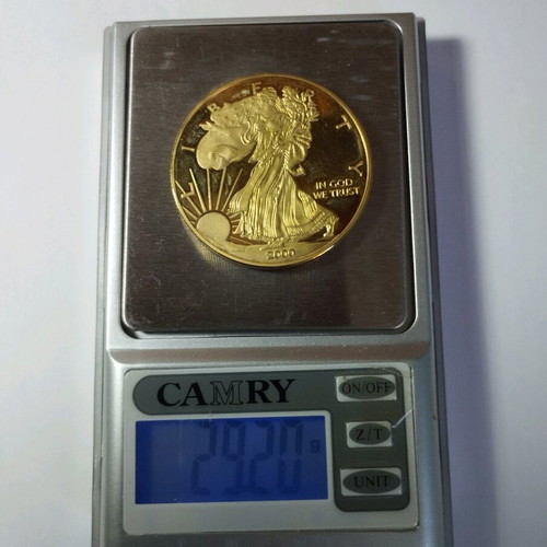Liberty Eagle gold-plated medal in velvet case like new