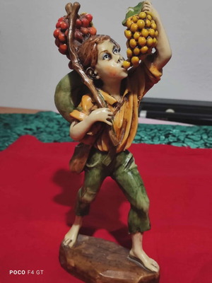 Vintage statue 'The Child with the Grapes' like new