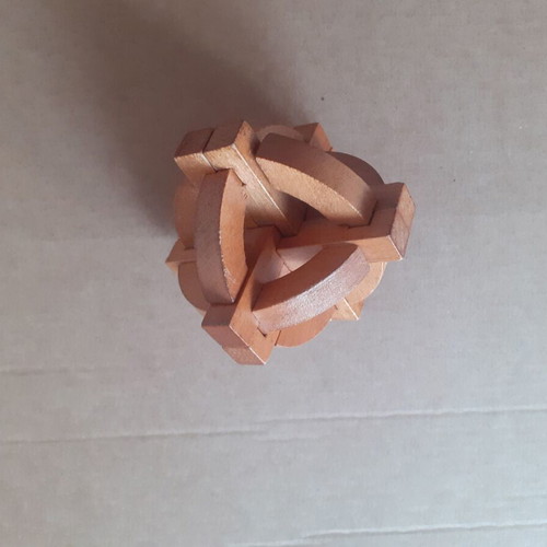 Metal and wooden puzzle like new, set of 2 pieces